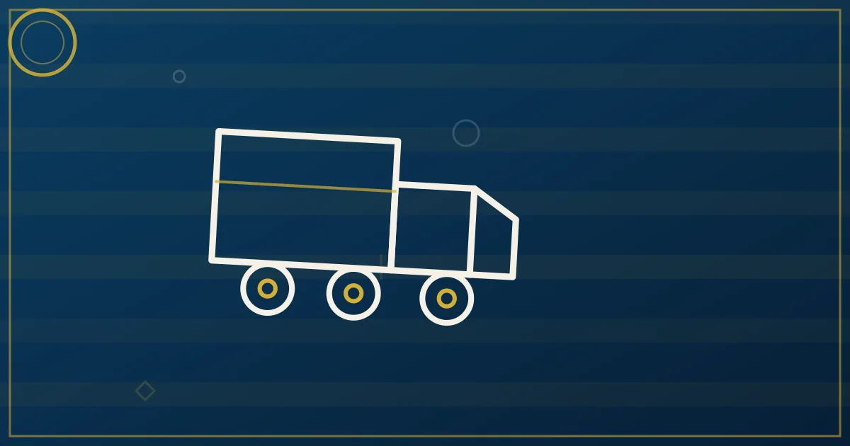 White box truck loading freight at a distribution center dock for regional last-mile delivery routes