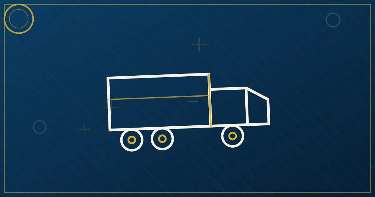 Buyer and dealer walking around a used semi truck during a pre-purchase inspection at a truck dealership lot