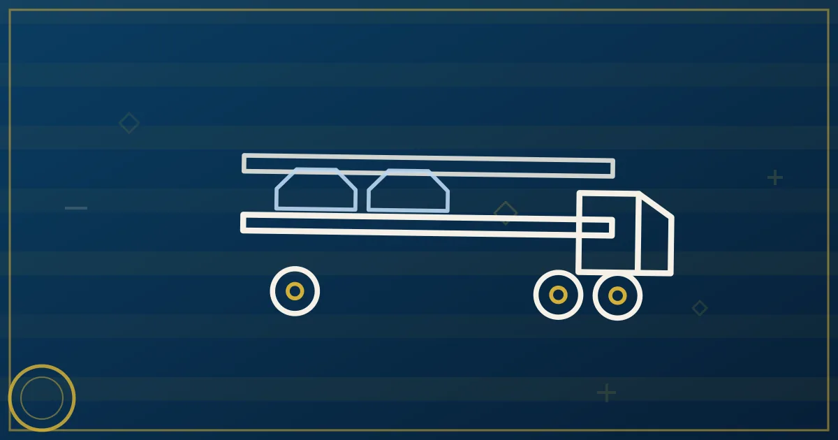 White open car hauler trailer loaded with vehicles on a highway at golden hour in lapis blue and gold tones