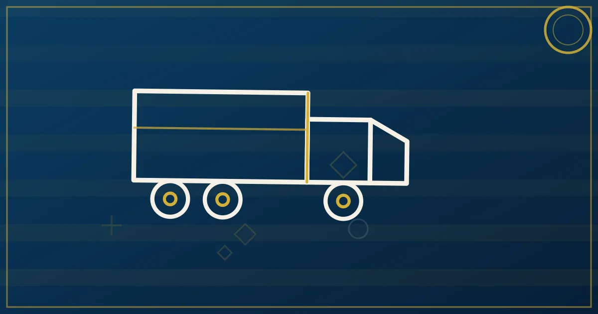 New CDL student driver practicing backing maneuvers in a semi truck at a company training yard