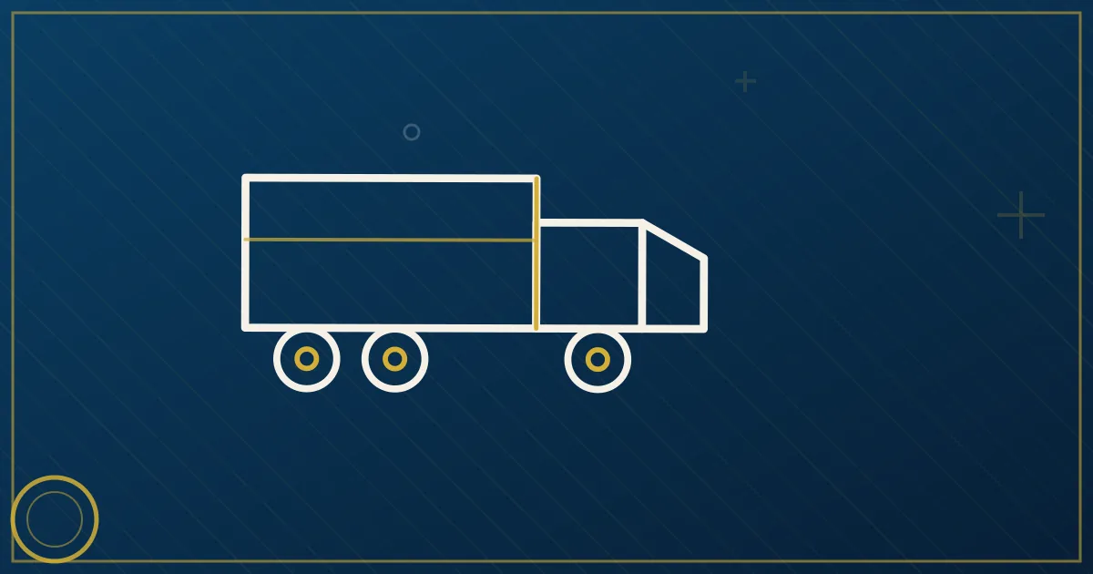 Red semi truck pulling a white dry van trailer on an interstate highway in lapis blue and gold tones