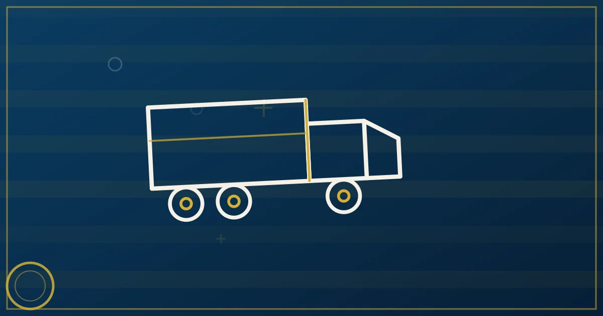 Lapis-blue and gold illustration of a desk with a phone, rate documents, and a semi truck through a window