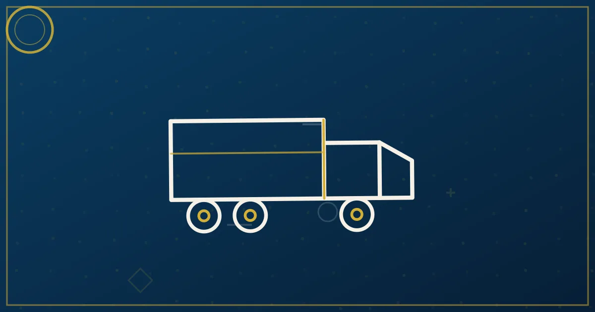 Semi truck dropping a dry van trailer at a distribution center yard illustrating drop-and-hook operations