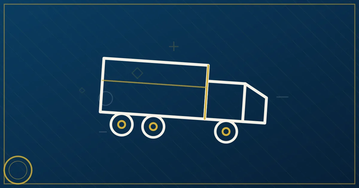 Black semi tractor running without a trailer on a highway at sunset in lapis blue and gold tones