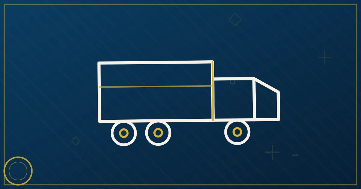 Semi truck stopped on a highway shoulder with hazard lights flashing and reflective warning triangles placed behind it