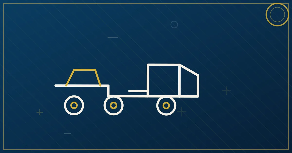 Lapis-blue and gold illustration: step deck trailer hauling machinery. No text, no people, no flags.