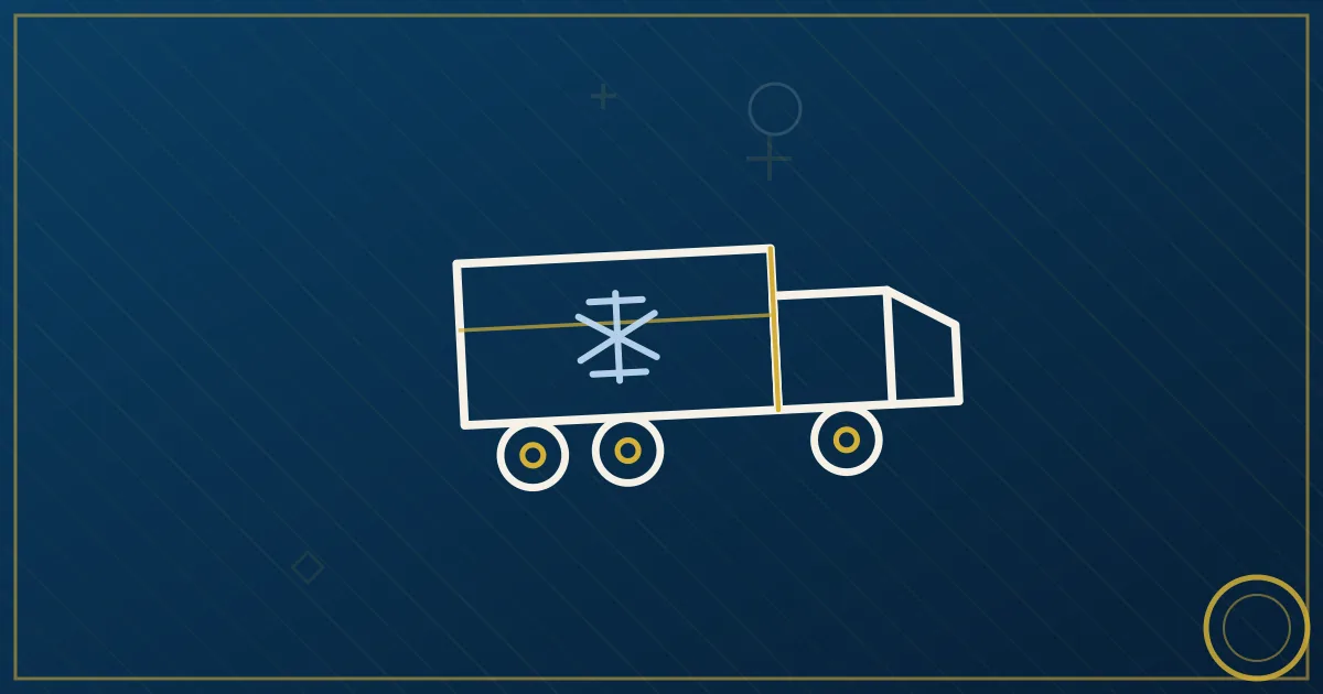Refrigerated trailer with cooling unit parked at a cold-storage warehouse dock in lapis blue and gold tones